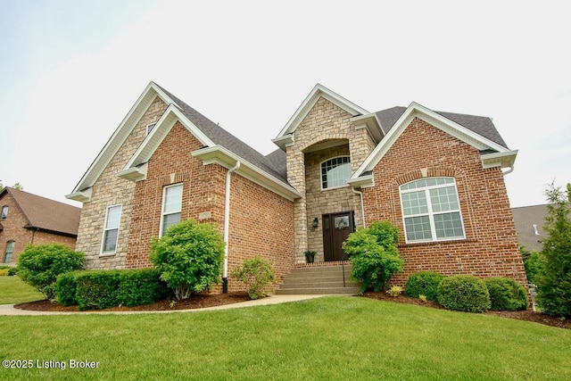 18705 Weymuth Ln, Louisville, KY 40245 - traditional-style house with a front lawn, brick siding, and stone siding