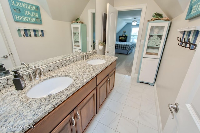18705 Weymuth Ln, Louisville, KY 40245 - ensuite bathroom featuring vaulted ceiling, double vanity, ceiling fan, and marble look tile flooring