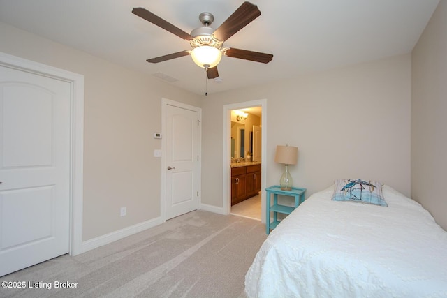 18705 Weymuth Ln, Louisville, KY 40245 - bedroom with light carpet, baseboards, connected bathroom, and ceiling fan