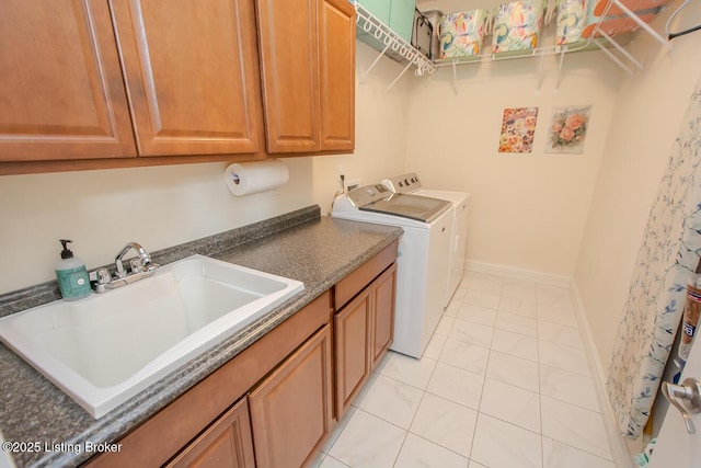 18705 Weymuth Ln, Louisville, KY 40245 - washroom with cabinet space, washing machine and dryer, and light marble finish floors