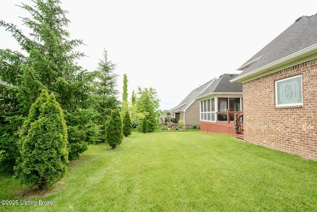 18705 Weymuth Ln, Louisville, KY 40245 - view of green lawn with a sunroom