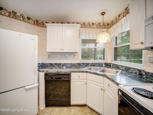 7906 Tuckaway Ct, Louisville, KY 40291 - kitchen featuring freestanding refrigerator, black dishwasher, a sink, dark countertops, and white cabinetry