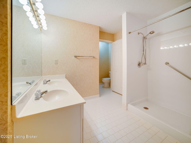 7906 Tuckaway Ct, Louisville, KY 40291 - full bath with tile patterned floors, a walk in shower, toilet, a textured ceiling, and double vanity