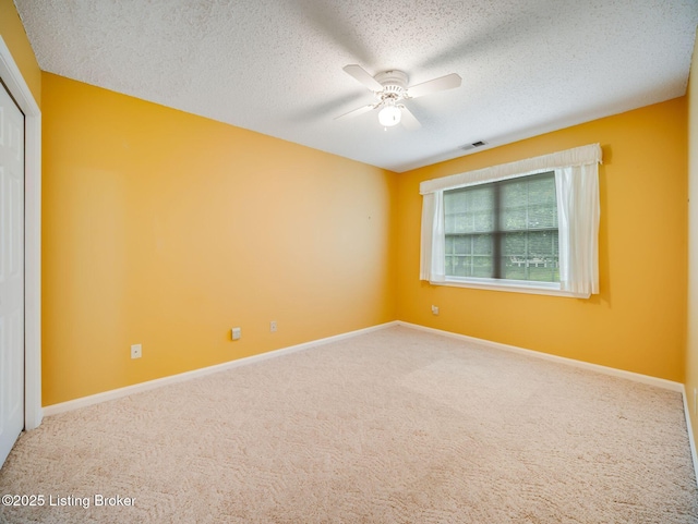 7906 Tuckaway Ct, Louisville, KY 40291 - unfurnished room featuring a ceiling fan, a textured ceiling, carpet flooring, and baseboards