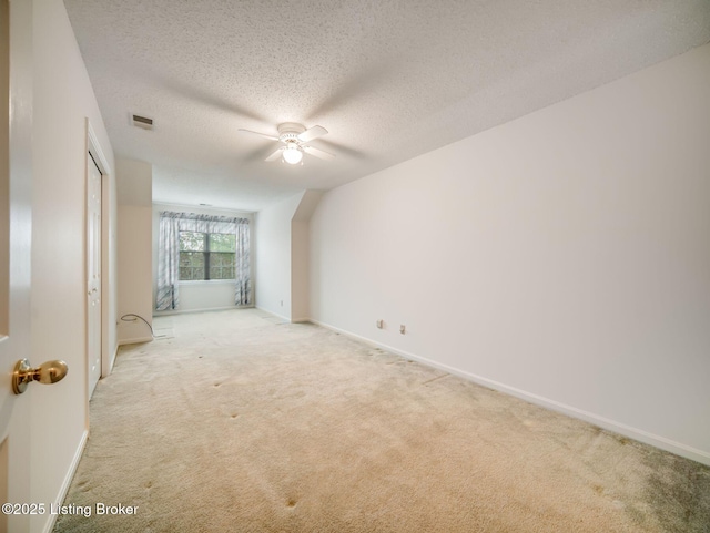 7906 Tuckaway Ct, Louisville, KY 40291 - unfurnished room featuring light colored carpet, a ceiling fan, a textured ceiling, and baseboards