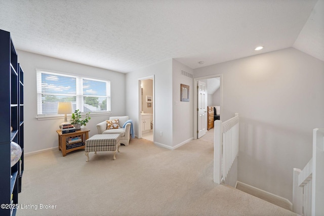 living area with an upstairs landing, light carpet, baseboards, recessed lighting, and lofted ceiling