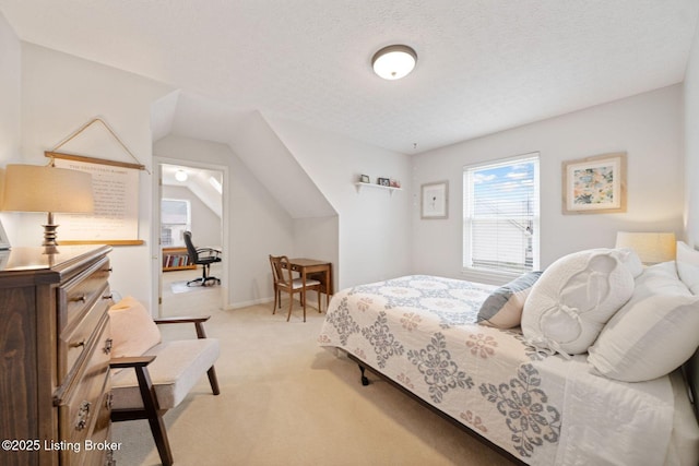 bedroom featuring light colored carpet