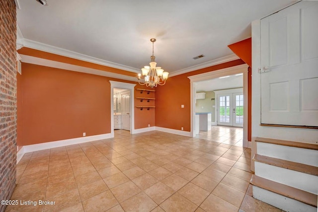 unfurnished room with a chandelier, light tile patterned floors, crown molding, french doors, and baseboards