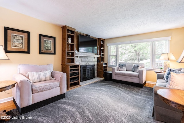 8703 Waltlee Rd, Louisville, KY 40291 - living area featuring baseboards, a textured ceiling, and wood finished floors