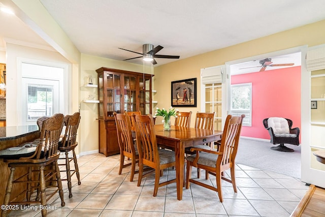 8703 Waltlee Rd, Louisville, KY 40291 - dining area featuring ceiling fan, healthy amount of natural light, and light tile patterned flooring