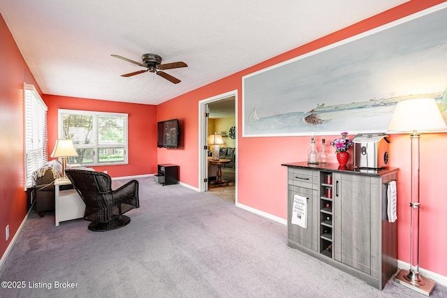 8703 Waltlee Rd, Louisville, KY 40291 - living area featuring a ceiling fan, baseboards, carpet, and a bar