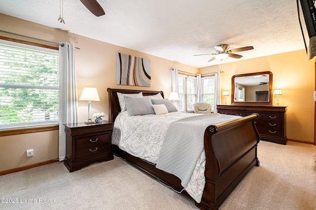8703 Waltlee Rd, Louisville, KY 40291 - bedroom with light carpet, baseboards, ceiling fan, and a textured ceiling