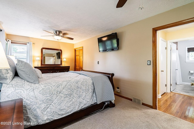 8703 Waltlee Rd, Louisville, KY 40291 - bedroom featuring a textured ceiling, baseboards, and ceiling fan