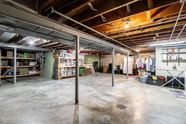8703 Waltlee Rd, Louisville, KY 40291 - unfinished below grade area with freestanding refrigerator