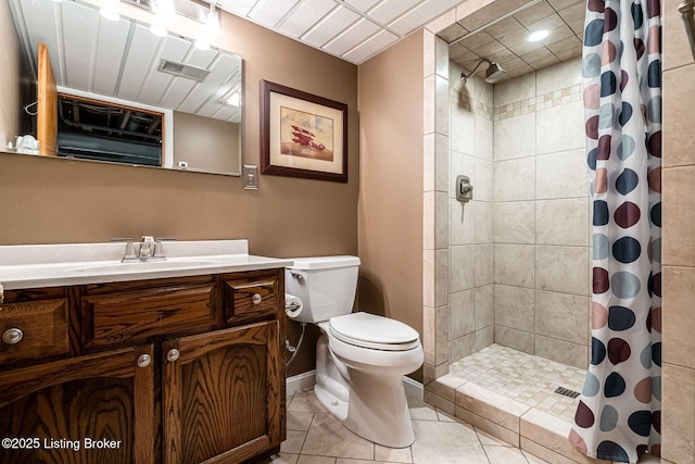 8703 Waltlee Rd, Louisville, KY 40291 - bathroom with toilet, tiled shower, vanity, tile patterned flooring, and baseboards