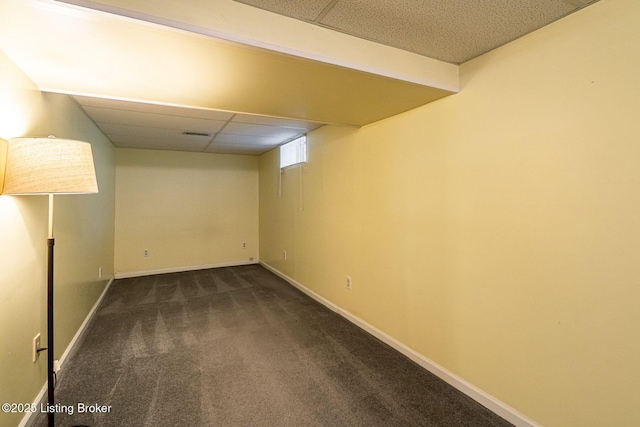8703 Waltlee Rd, Louisville, KY 40291 - below grade area with dark colored carpet, a drop ceiling, and baseboards