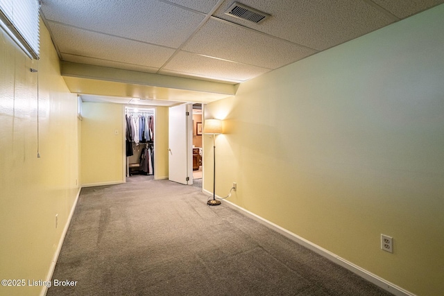 8703 Waltlee Rd, Louisville, KY 40291 - finished basement featuring carpet floors, baseboards, and a paneled ceiling