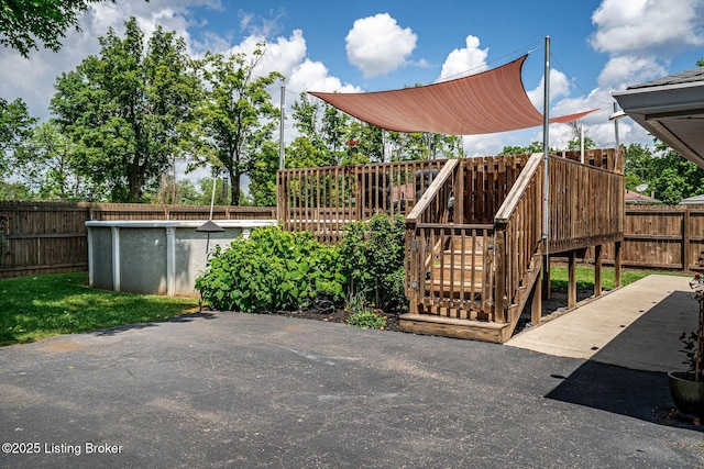 8703 Waltlee Rd, Louisville, KY 40291 - view of patio featuring a fenced backyard and a deck