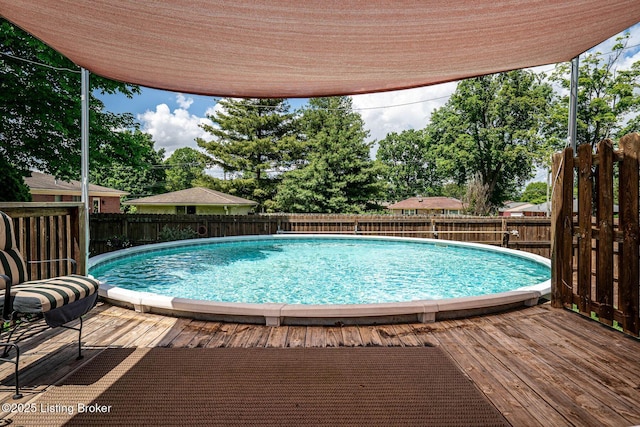 8703 Waltlee Rd, Louisville, KY 40291 - view of swimming pool with a fenced backyard and a wooden deck