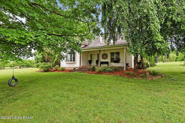 view of front facade featuring a porch, a front lawn, and a chimney
