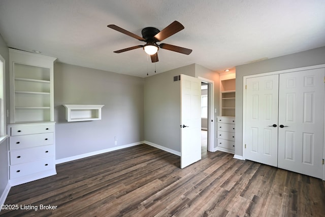4433 Malcolm Rd, Louisville, KY 40216 - unfurnished bedroom featuring baseboards, dark wood-style floors, a closet, and ceiling fan