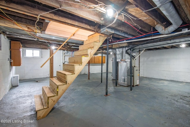 below grade area with stairway and heating unit