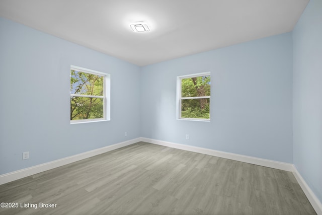 5319 New Cut Rd, Louisville, KY 40214 - empty room featuring wood finished floors and baseboards