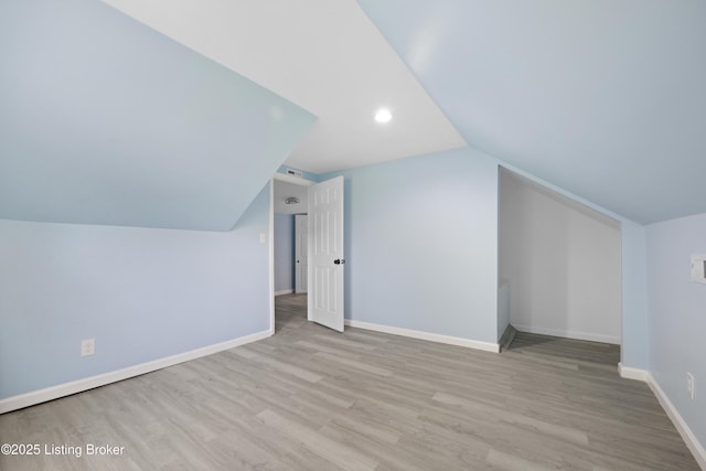5319 New Cut Rd, Louisville, KY 40214 - bonus room featuring lofted ceiling, wood finished floors, baseboards, and recessed lighting