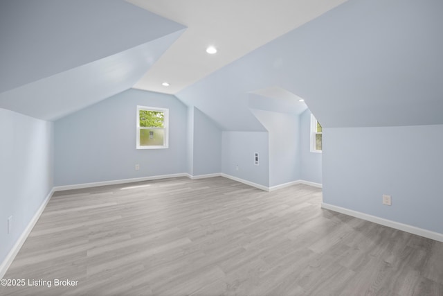 5319 New Cut Rd, Louisville, KY 40214 - additional living space featuring light wood-type flooring, vaulted ceiling, baseboards, and recessed lighting