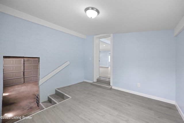 5319 New Cut Rd, Louisville, KY 40214 - stairs with wood finished floors and baseboards