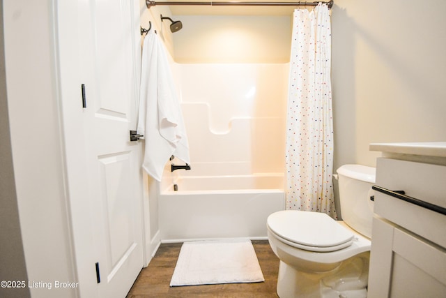 9206 Fox Chase Rd, Louisville, KY 40228 - bathroom featuring toilet, wood finished floors, vanity, and shower / bath combo with shower curtain