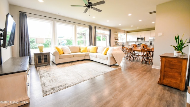 9206 Fox Chase Rd, Louisville, KY 40228 - living room with a ceiling fan, wood finished floors, and recessed lighting