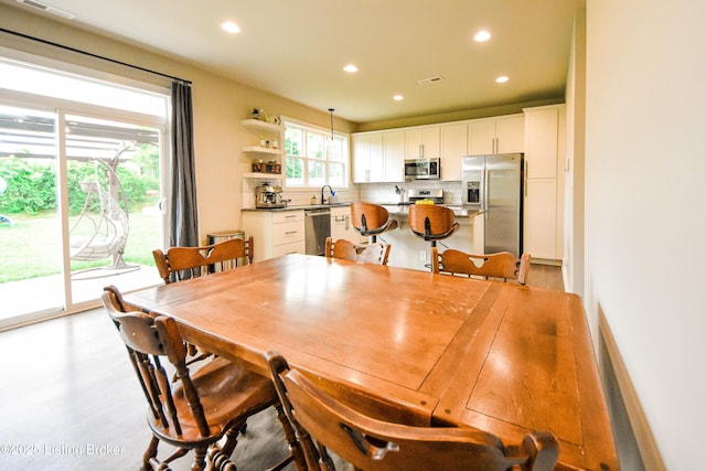 9206 Fox Chase Rd, Louisville, KY 40228 - dining space featuring recessed lighting and light wood-style floors