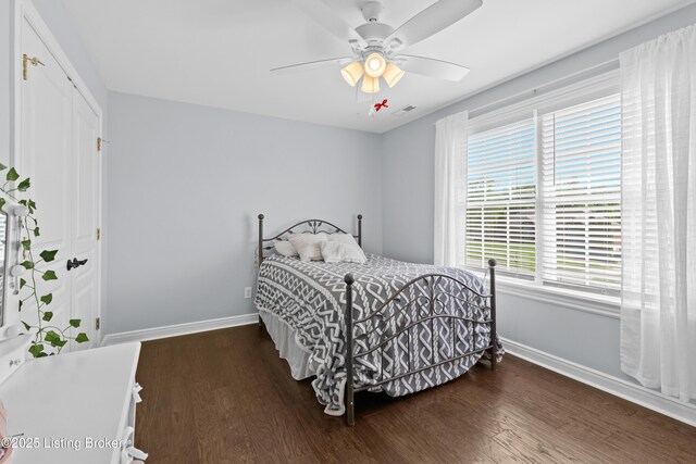 4026 Old Farm Dr, Crestwood, KY 40014 - bedroom featuring baseboards, wood finished floors, a ceiling fan, and a closet