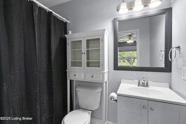 267 Stellar Dr, Shepherdsville, KY 40165 - full bathroom with toilet, vanity, a ceiling fan, baseboards, and curtained shower