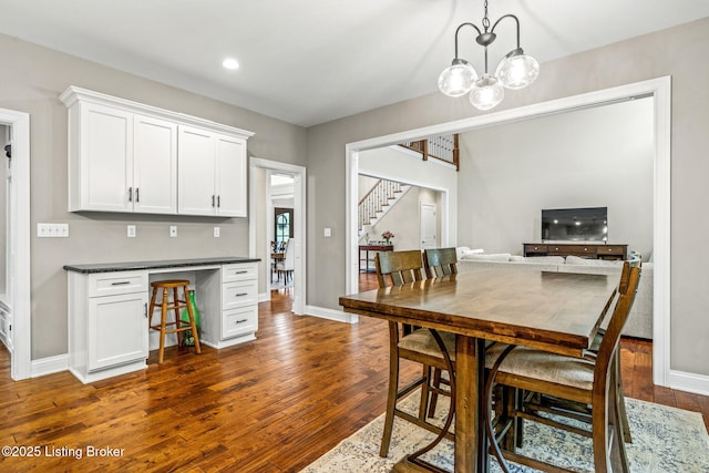 13412 Hampton Cir, Goshen, KY 40026 - dining space with dark wood-type flooring, stairway, baseboards, a chandelier, and recessed lighting