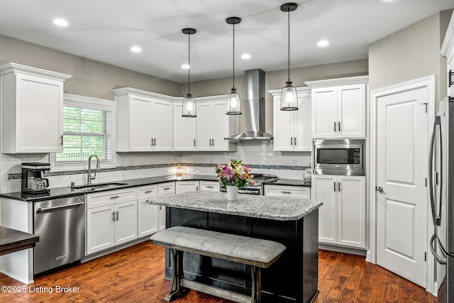 13412 Hampton Cir, Goshen, KY 40026 - kitchen with stainless steel appliances, wall chimney range hood, a sink, white cabinets, and backsplash