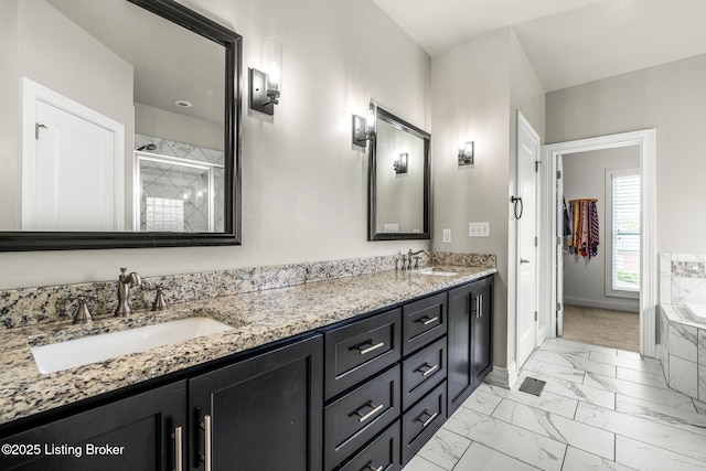 13412 Hampton Cir, Goshen, KY 40026 - full bath with marble look tiles, baseboards, double vanity, a bath, and a shower stall