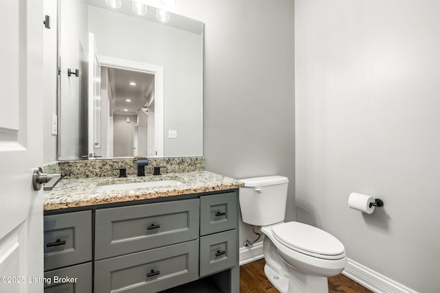 13412 Hampton Cir, Goshen, KY 40026 - bathroom featuring baseboards, vanity, toilet, and wood finished floors