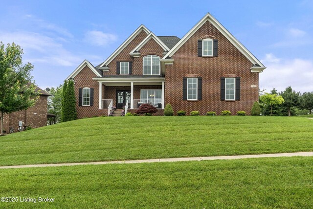 13412 Hampton Cir, Goshen, KY 40026 - view of front of house with brick siding, covered porch, and a front lawn