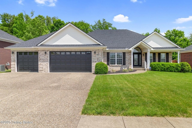view of front of property featuring concrete driveway, an attached garage, a front yard, and brick siding