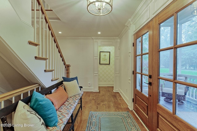 801 Shady Ln, Anchorage, KY 40223 - entryway with baseboards, plenty of natural light, crown molding, light wood finished floors, and stairs