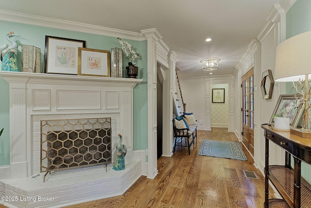 801 Shady Ln, Anchorage, KY 40223 - corridor featuring light wood-style floors, ornamental molding, recessed lighting, baseboards, and french doors