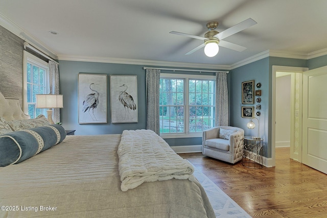 801 Shady Ln, Anchorage, KY 40223 - bedroom featuring wood finished floors, baseboards, crown molding, and a ceiling fan