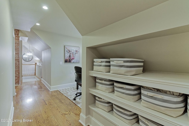 801 Shady Ln, Anchorage, KY 40223 - office space with wood finished floors, baseboards, lofted ceiling, recessed lighting, and a chandelier