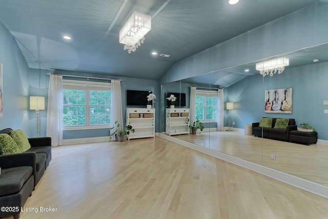 801 Shady Ln, Anchorage, KY 40223 - living room with a chandelier, vaulted ceiling, wood finished floors, baseboards, and recessed lighting