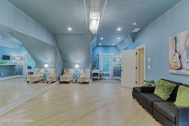 801 Shady Ln, Anchorage, KY 40223 - living area with lofted ceiling, wood finished floors, a chandelier, baseboards, and recessed lighting
