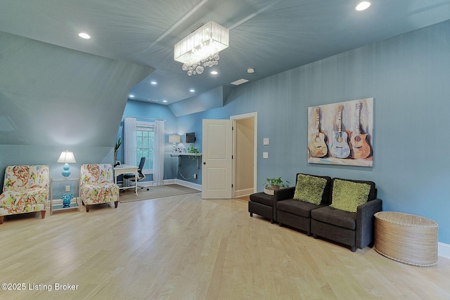 801 Shady Ln, Anchorage, KY 40223 - living area with vaulted ceiling, wood finished floors, recessed lighting, a chandelier, and baseboards