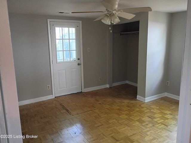 1244 Belmar Dr, Louisville, KY 40213 - doorway with a ceiling fan and baseboards