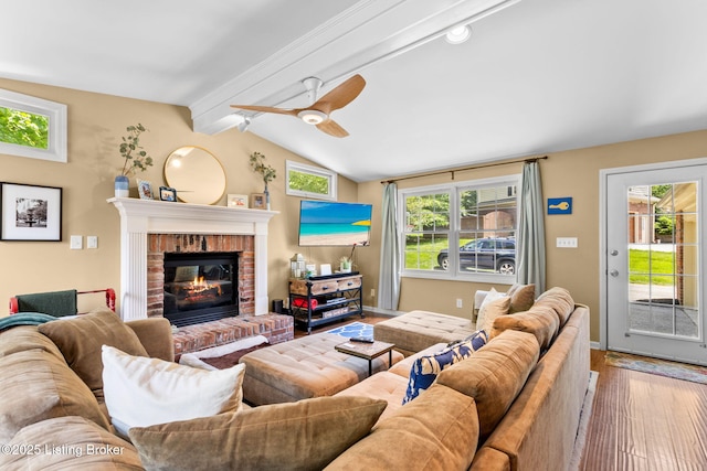 3711 Quail Hollow Ct, Louisville, KY 40241 - living room with wood finished floors, ceiling fan, a brick fireplace, and baseboards